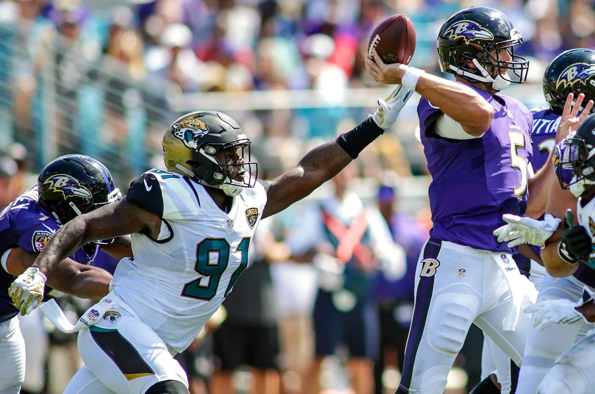 Yannick-Ngakoue-Joe-Flacco.jpg